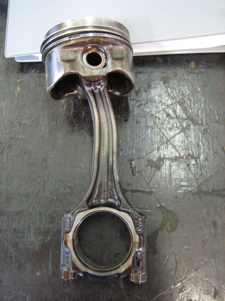 What Does A Loud Knocking Or Clanking Sound Coming From Your Engine 